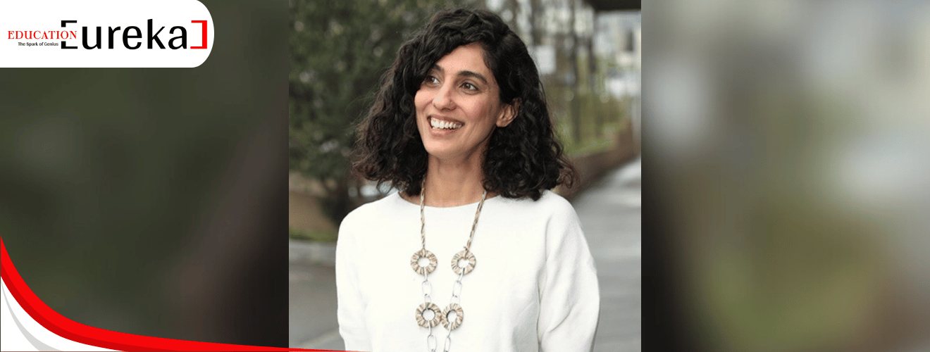Diya Kanoria, founder of Gaia Changemakers Program, smiling outdoors in a white sweater and statement necklace.