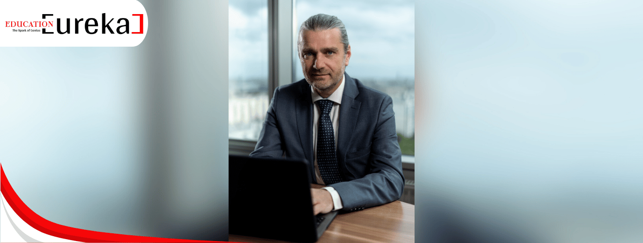 Károly Krokovay – Education Innovator Working at Office