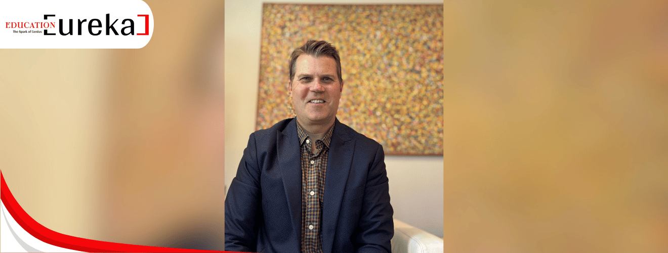 Stephen Panus smiling in a navy blazer, featured in Education Eureka’s keynote speakers list for 2025.