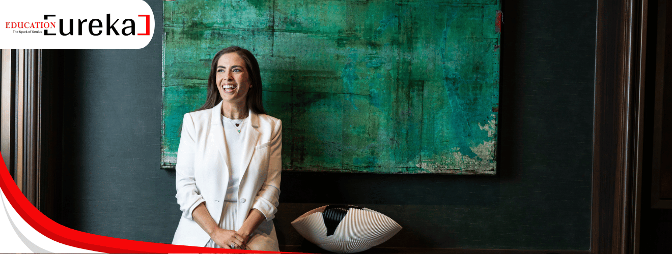 Jessica Abo, keynote speaker and confidence expert, smiling in white suit