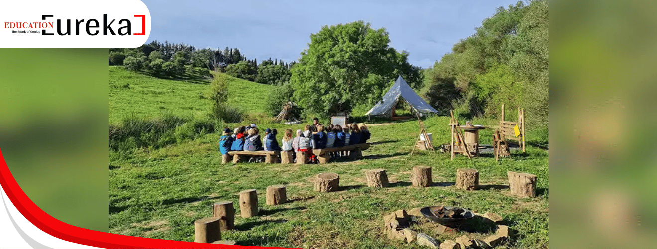 Alma Forest School students learning outdoors in a natural forest setting.